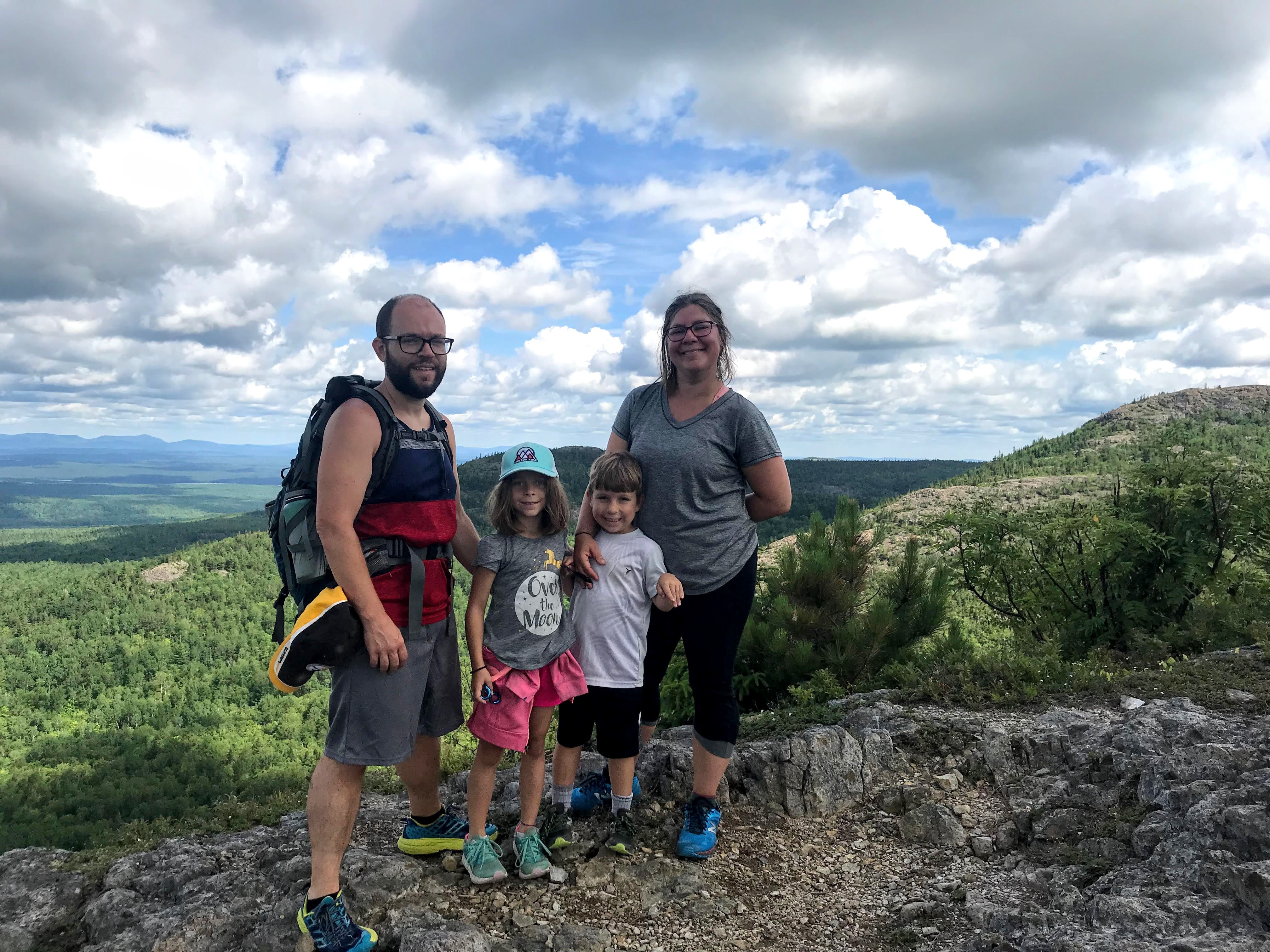 Justin Rent and his family hiking