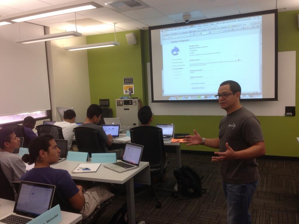 Mario Hernandez teaching the students of TxT, Teens Exploring Technology